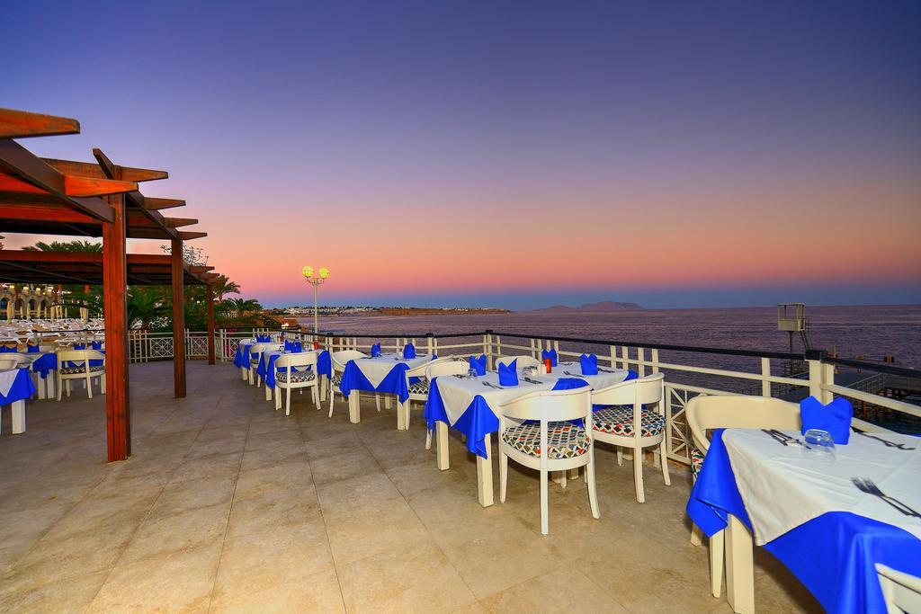 Stella Di Mare Beach Hotel & Spa Шарм ел-Шейх Екстериор снимка Sunset at the restaurant